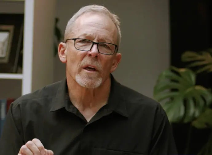 An image of Bill Griffin speaking in Lesson 1, 'When God Began.'